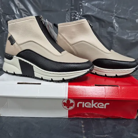 BOXED PAIR OF RIEKER HI TOP TRAINERS IN OFF WHITE SIZE 5