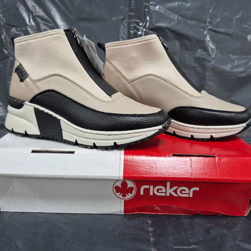 BOXED PAIR OF RIEKER HI TOP TRAINERS IN OFF WHITE SIZE 5