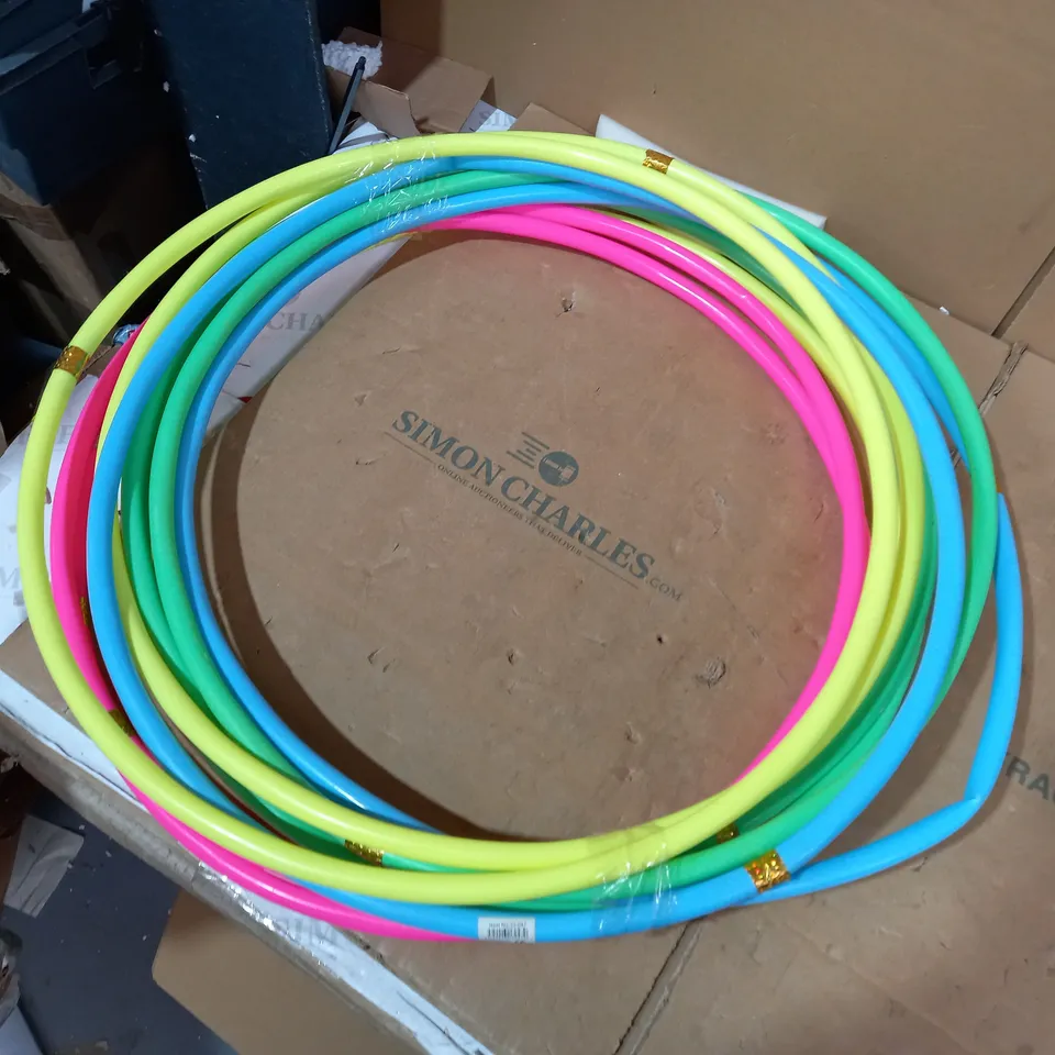 LOT OF APPROXIMATELY 8 ASSORTED DESIGNER HULA HOOPS