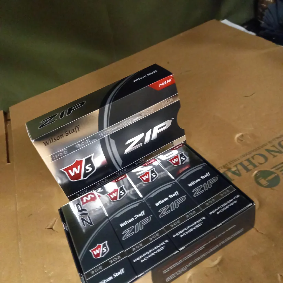 LOT OF 4 ZIP BOXES OF GOLF BALLS   