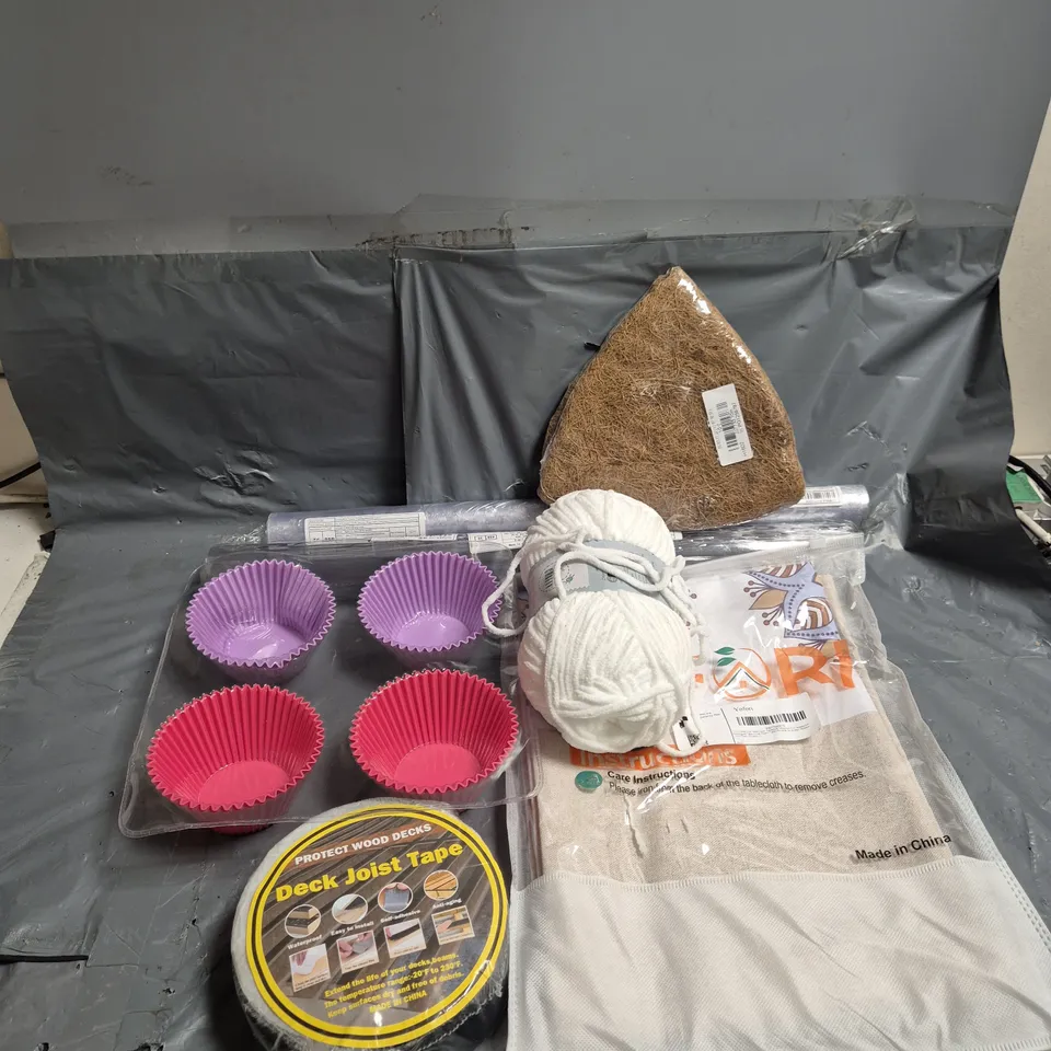 APPROXIMATELY 15 ASSORTED HOUSEHOLD PRODUCTS TO INCLUDE DECK JOIST TAPE, TABLECLOTH, BABY YARN, ETC