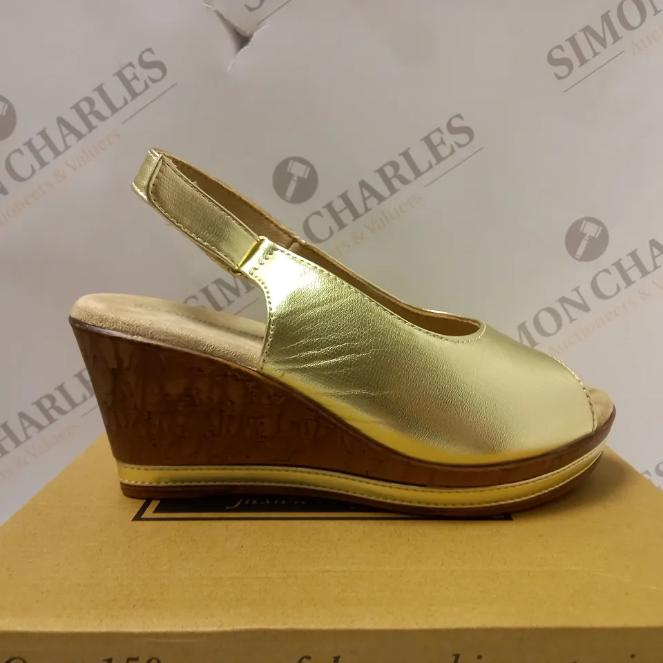 BOXED PAIR OF CUSHION WALK GOLD WEDGE HEEL SHOES, GOLD - SIZE 5
