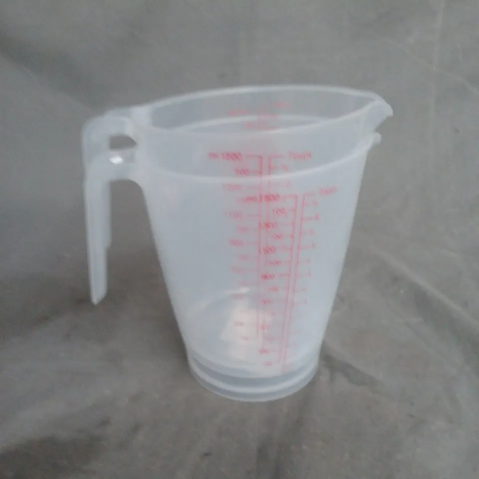 BOX OF APPROXIMATELY 20 ASSORTED HOUSEHOLD ITEMS INCLUDING MEASURING JUGS , DISPOSABLE BREAST PADS AND CHRISTMAS WRAPPING PAPER