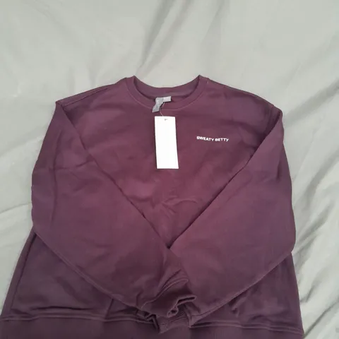 SWEATY BETTY REVIVE CREW NECK SWEATHIRT IN MIDNIGHT CHERRY PURPLE SIZE S/M