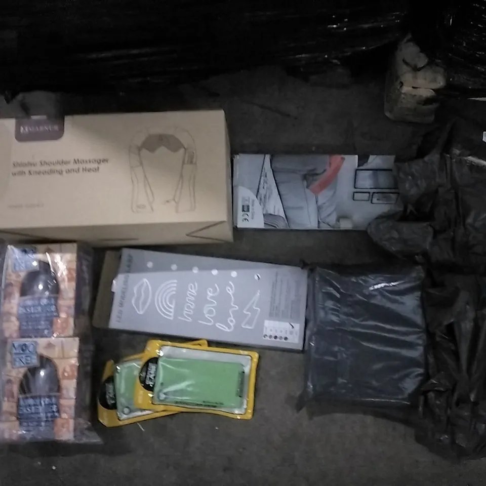 PALLET OF ASSORTED ITEMS INCLUDING BUNNY COMB EASTER EGGS, PROTECTIVE CASE, LED MODELING LAMP, MARNUR SHOULDER MASSAGER, WASTOU SKIPPING ROPE, KITCHEN APRON   