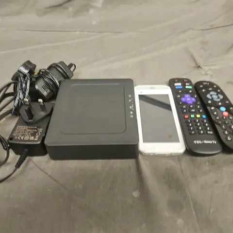 TOTE OF APPROXIMATELY 10 ASSORTED HOUSEHOLD ITEMS TO INCLUDE REMOTE CONTROLS, CARD READER AND CABLES