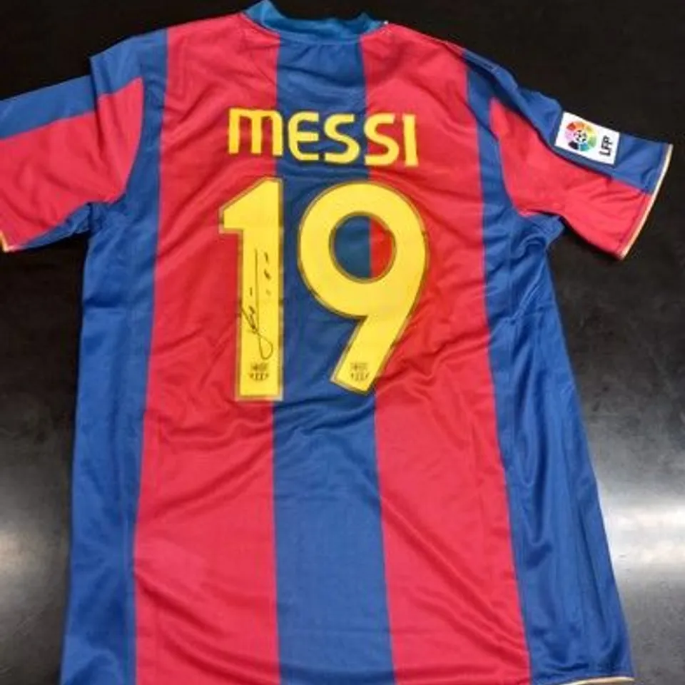 BARCELONA FC HOME JERSEY SIGNED BY LIONEL MESSI WITH CERTIFICATE OF AUTHENTICITY