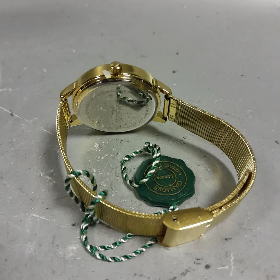 GAMAGES MIDNIGHT CRYSTAL GOLD GREEN DIAL WATCH 