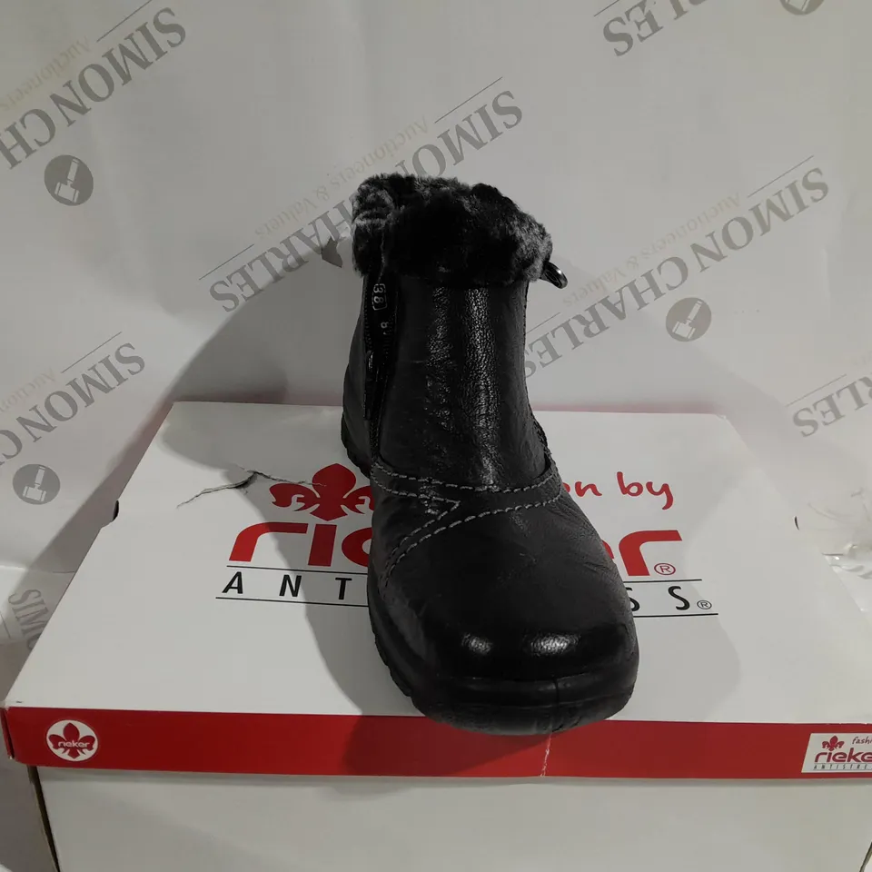 BOXED PAIR OF RIEKER ANKLE BOOTS WITH FUR CUFF IN BLACK - SIZE 5