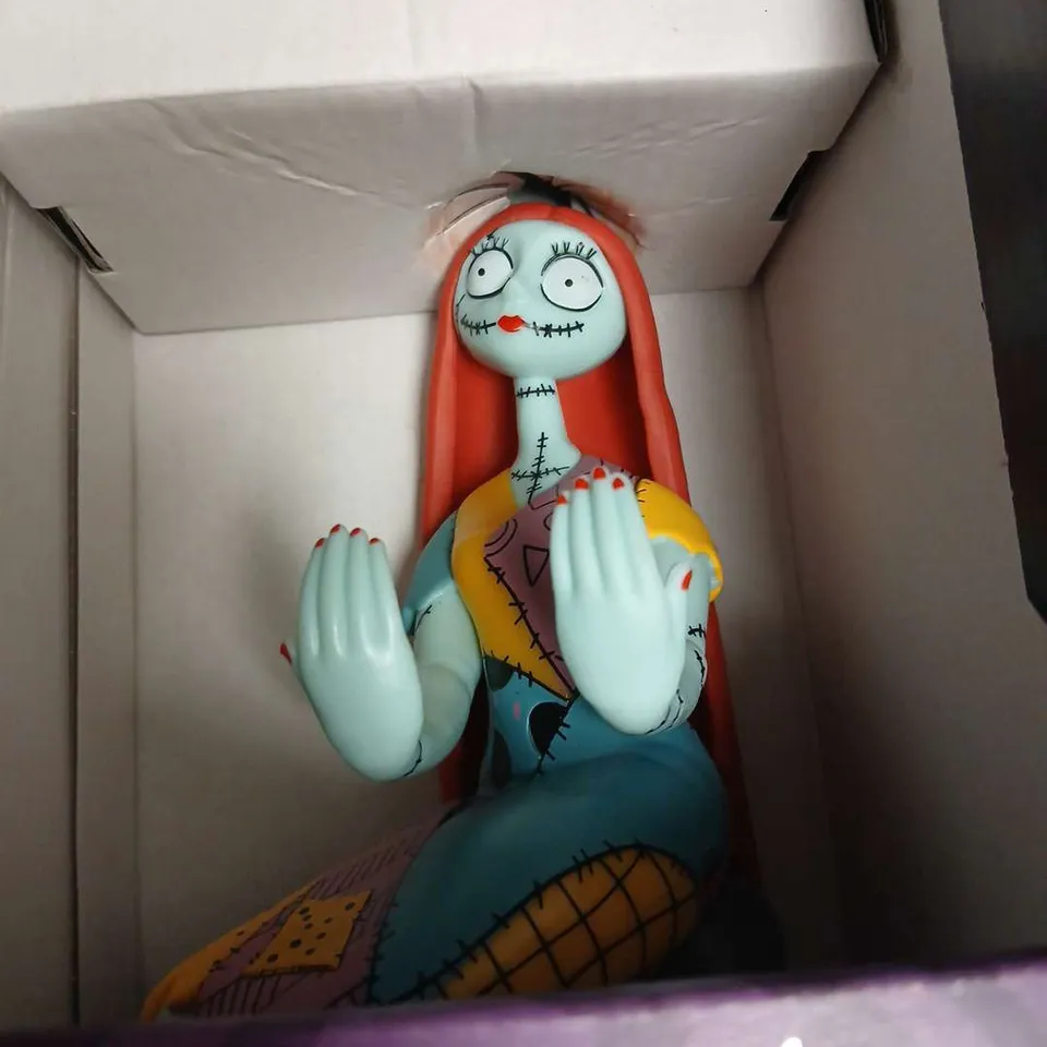 THE NIGHTMARE BEFORE CHRISTMAS – SALLY PHONE & CONTROLLER HOLDER FIGURINE