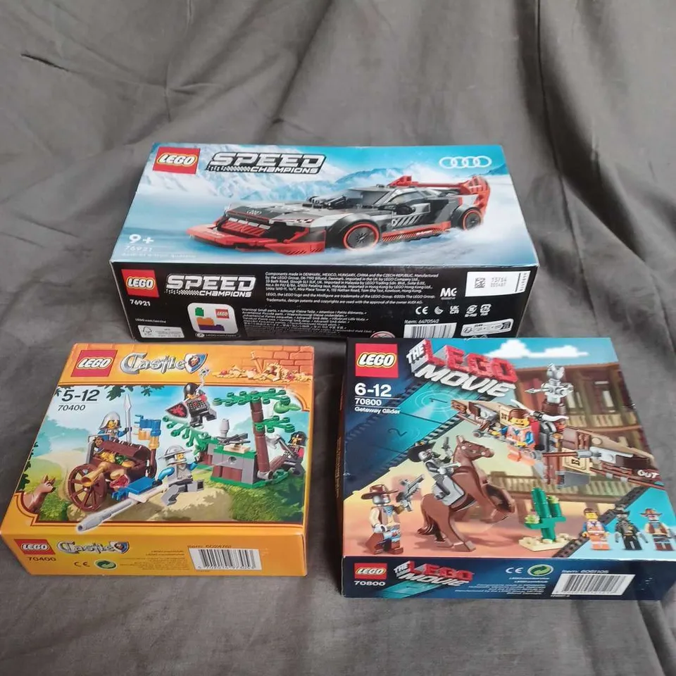 LOT OF 3 ASSORTED SEALED LEGO SETS TO INCLUDE - SPEED CHAMPIONS AUDI S1 E-TRON QUATTRO - LEGO MOVIE GETAWAY GLIDER - CASTLE 70400