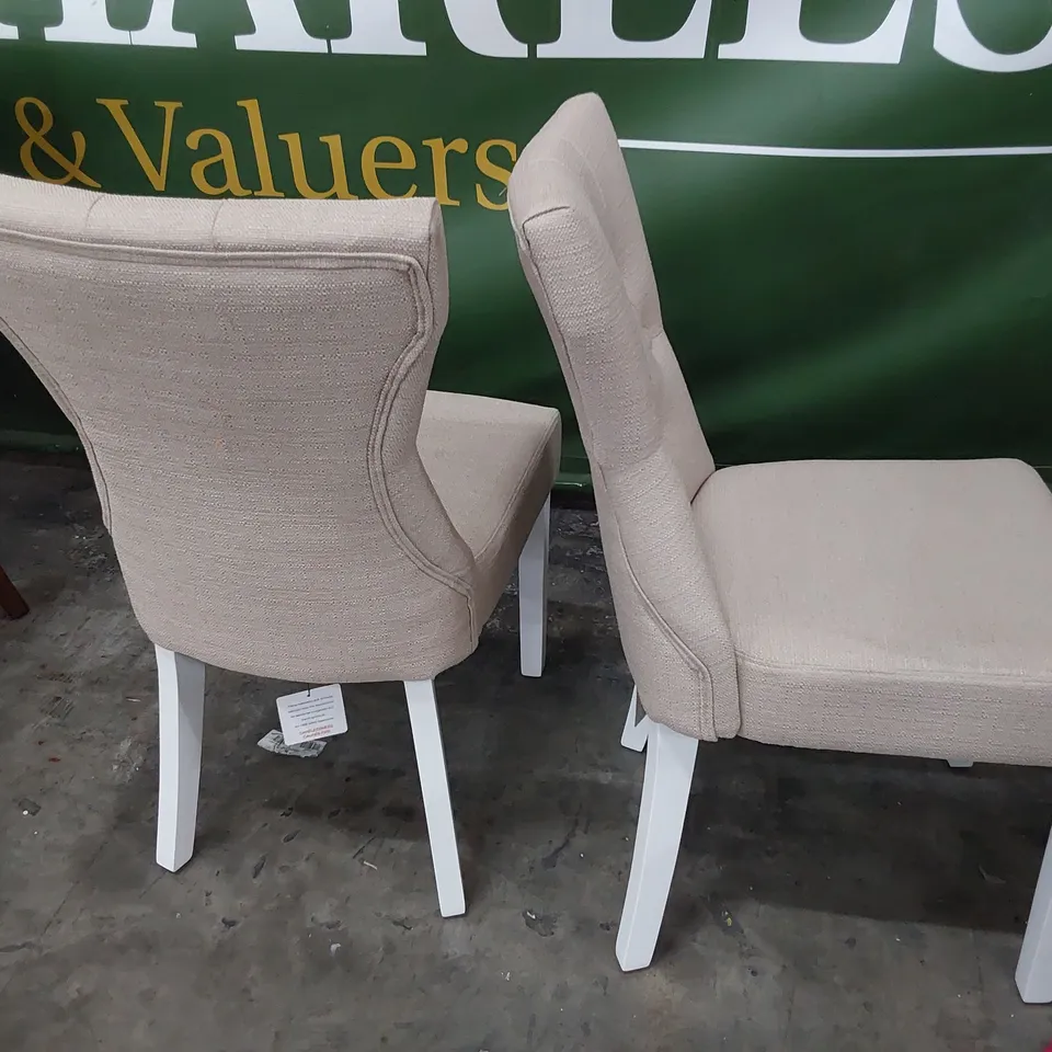PAIR OF UPHOLSTERED BUTTONED BACK DINING CHAIRS BEIGE FABRIC ON WHITE PAINTED LEGS 