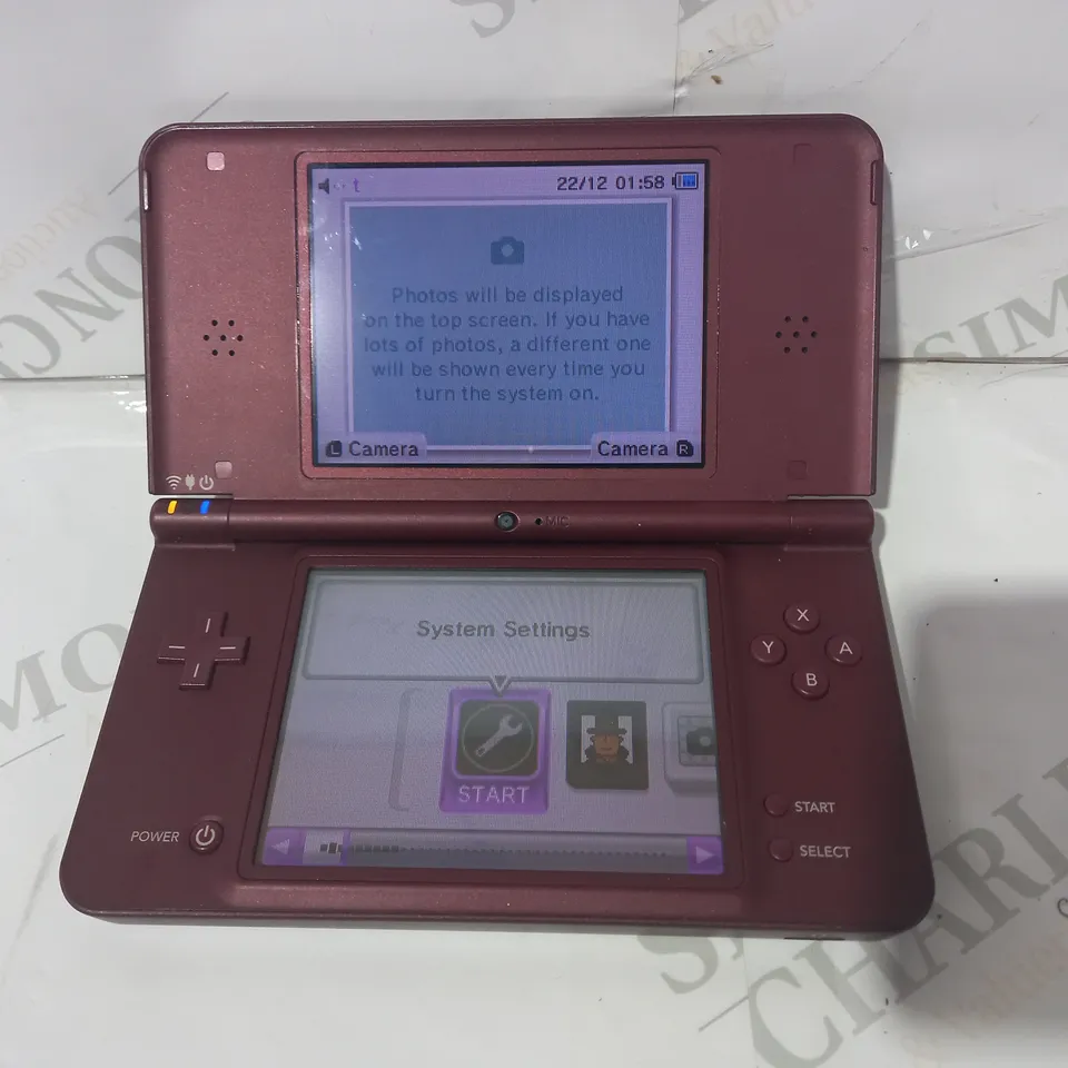 NINTENDO DSI XL IN BURGUNDY WITH PROFESSOR LAYTON GAME
