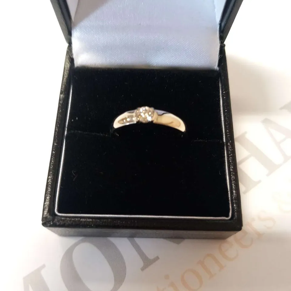 18CT WHITE GOLD SOLTAIRE RING SEMI-TENSION SET WITH A NATURAL DIAMOND 