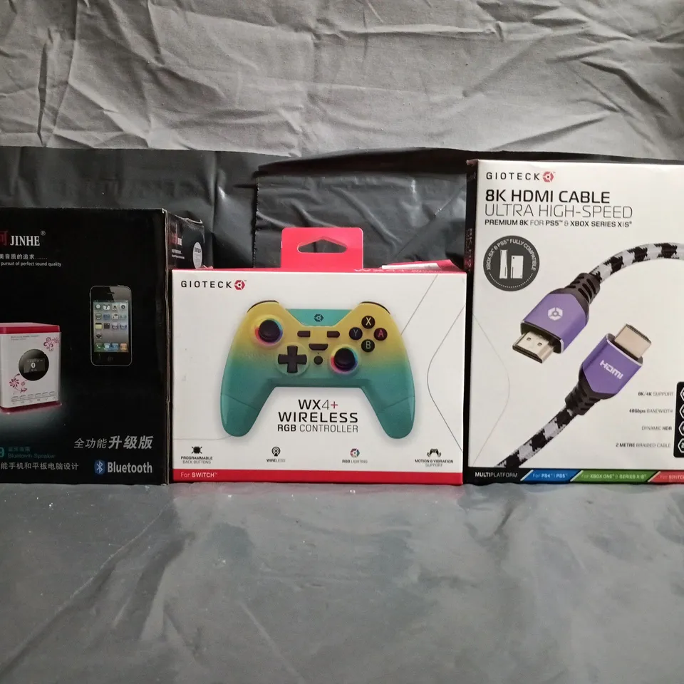 BOX OF APPROXIMATELY 10 HOUSEHOLD ITEMS TO INCLUDE HDMI CABLE, WIRELESS RGB CONTROLLER, BLUETOOTH SPEAKER, ETC - COLLECTION ONLY