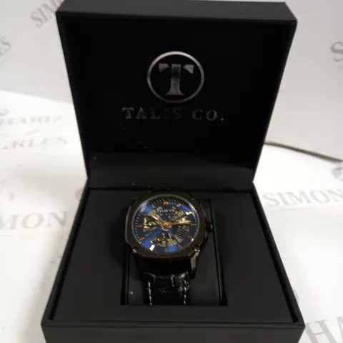 MENβS TALIS CO 9185 AUTOMATIC SKELETON WATCH β BLUE DIAL β BLACK COLOUR CASE β GLASS EXHIBITION CASE BACK β LEATHER STRAP