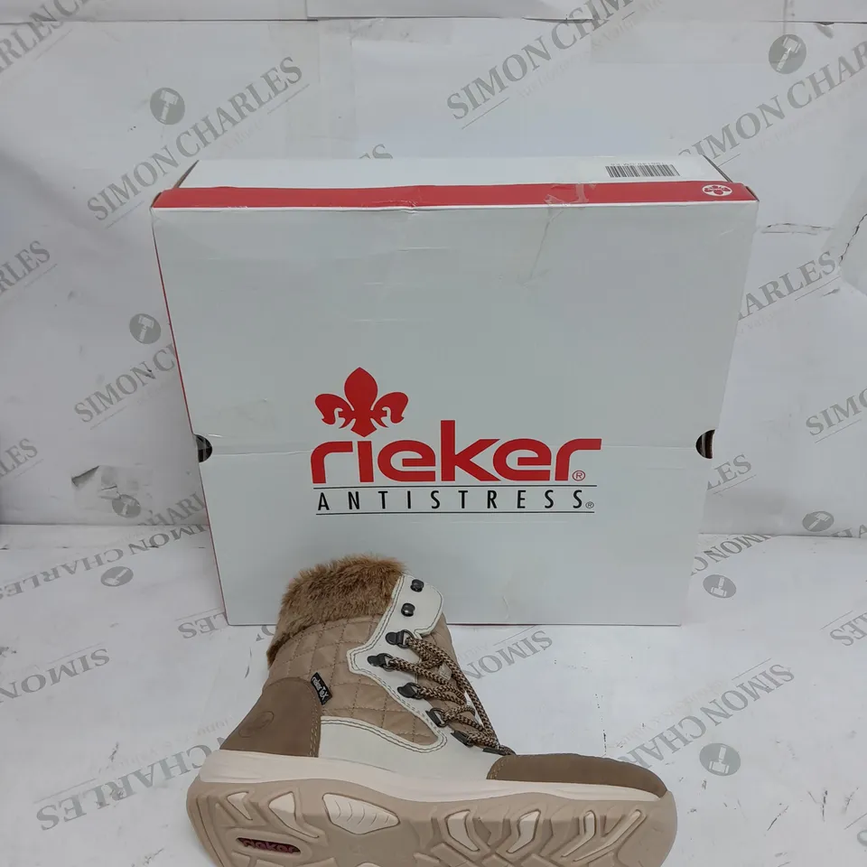 BOXED PAIR OF RIEKER CREAM WINTER FUR HIKE BOOTS IN SIZE 5 