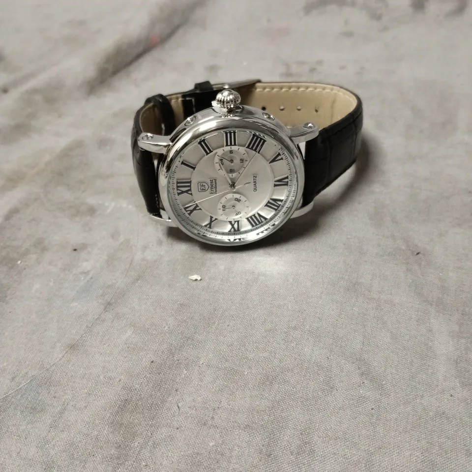 ERNEST FERDINAND QUARTZ WRISTWATCH – SILVER DIAL, ROMAN NUMERALS, BLACK LEATHER STRAP (BOXED)