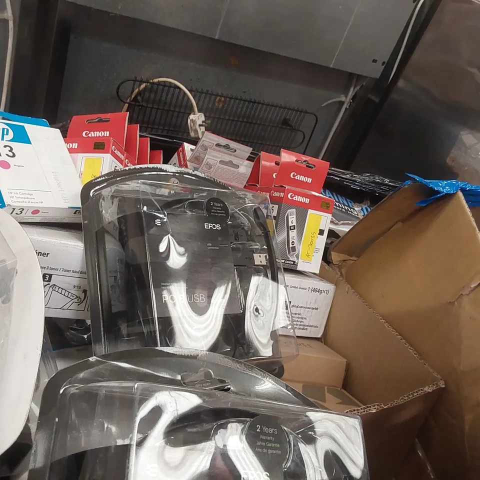 PALLET CONTAINING A LARGE ASSORTMENT OF OFFICE SUPPLIES INCLUDING: HEADSETS, ASSORTED WIRES/POWER CABLES, CANON/HP INK CARTRIDGES ECT