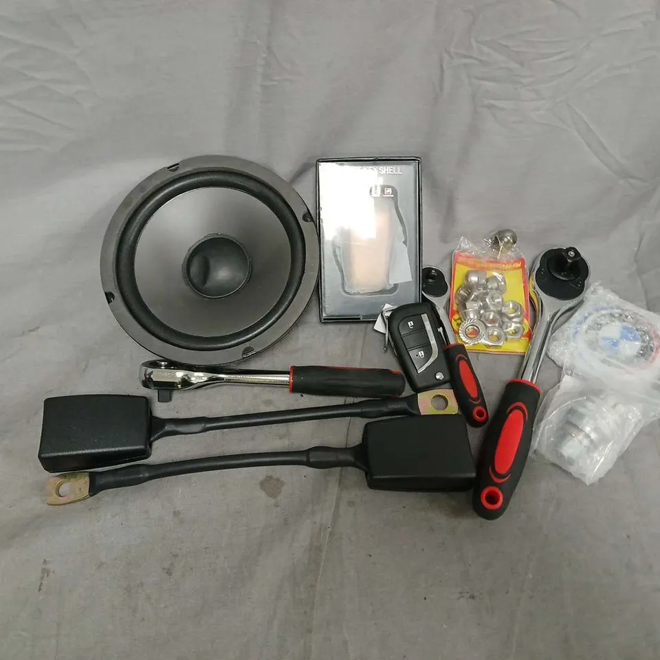 APPROXIMATELY 8 ASSORTED VEHICLE PARTS & ACCESORIES TO INCLUDE SOCKET WRENCH, CAR SPEAKER, BELT BUCKLE, ETC