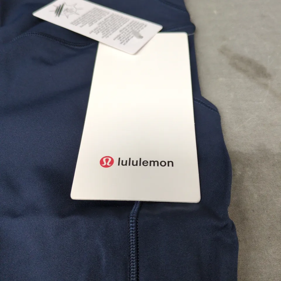 LULULEMON FAST AND FREE HR TIGHT 25" LENGTH WITH POCKETS SIZE 4