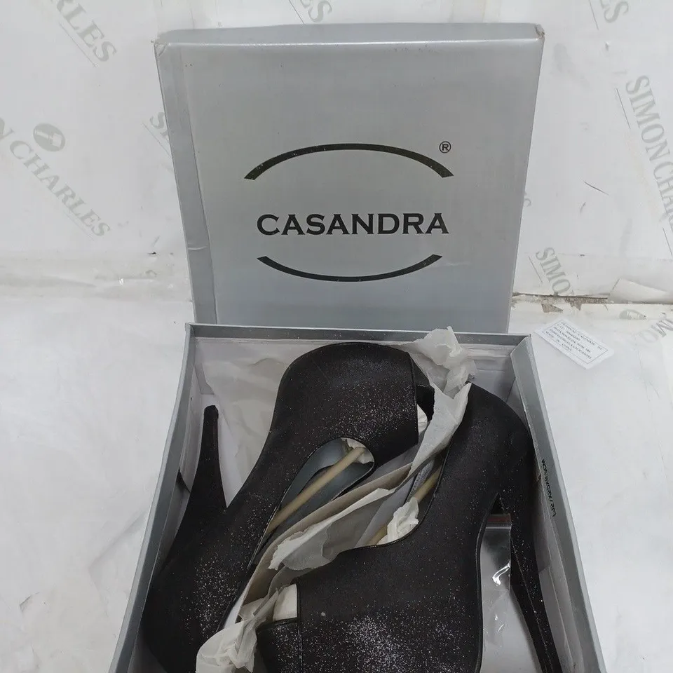 LARGE BOX OF APPROXIMATELY 10 BOXED CASANDRA BLACK GLITTER OPEN TOE HEELS IN VARIOUS SIZES 