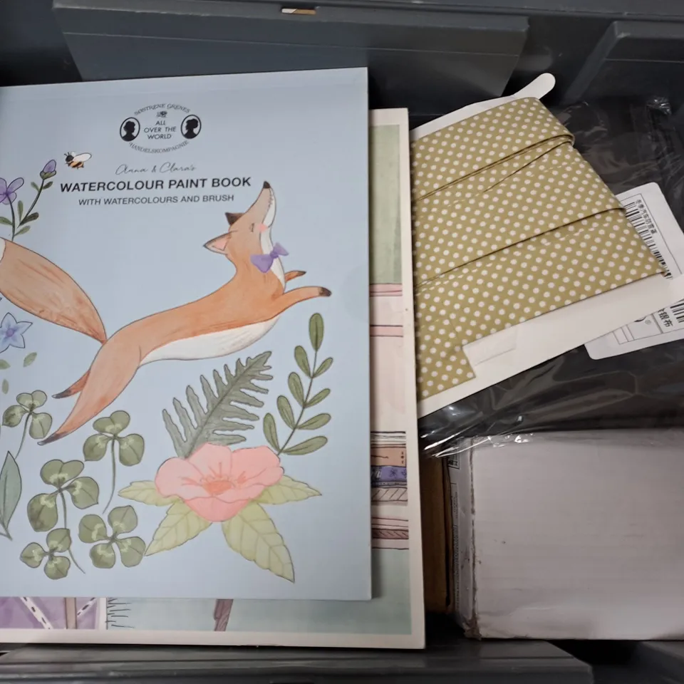 APPROXIMATELY 12 ASSORTED HOUSEHOLD ITEMS TO INCLUDE WATERCOLOUR PAINT BOOK, PAPERBLANKS, RAFFLE TICKETS, ETC