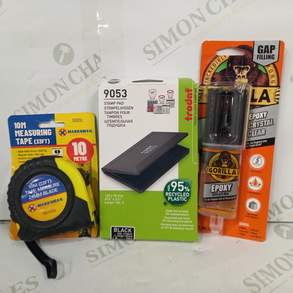 LOT OF APPROXIMATELY 10 ASSORTED HOUSEHOLD ITEMS TO INCLUDE GORILLA EPOXY, STAMP PAD, TAPE MEASURE, ETC