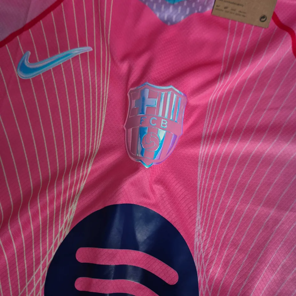 NIKE FC BARCELONA PINK SPOTIFY DRI-FIT FOOTBALL SHIRT – MEN’S SIZE M