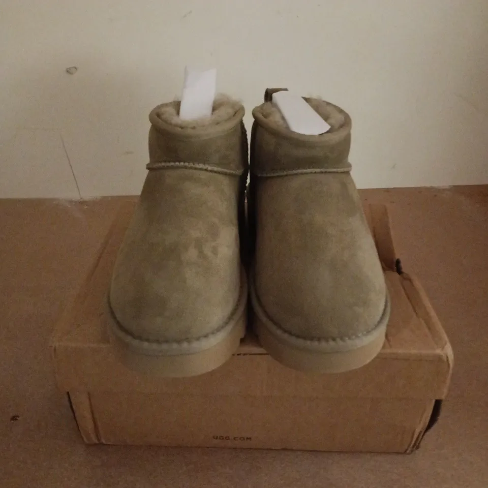 BOXED PAIR OF UGG W CLASSIC ULTRA MINI IN TAN - UK 7