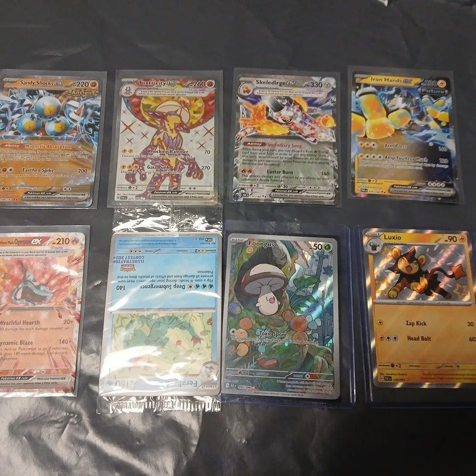MIXED LOT OF APPROXIMATELY 24 RARER POKÉMON TRADING CARDS