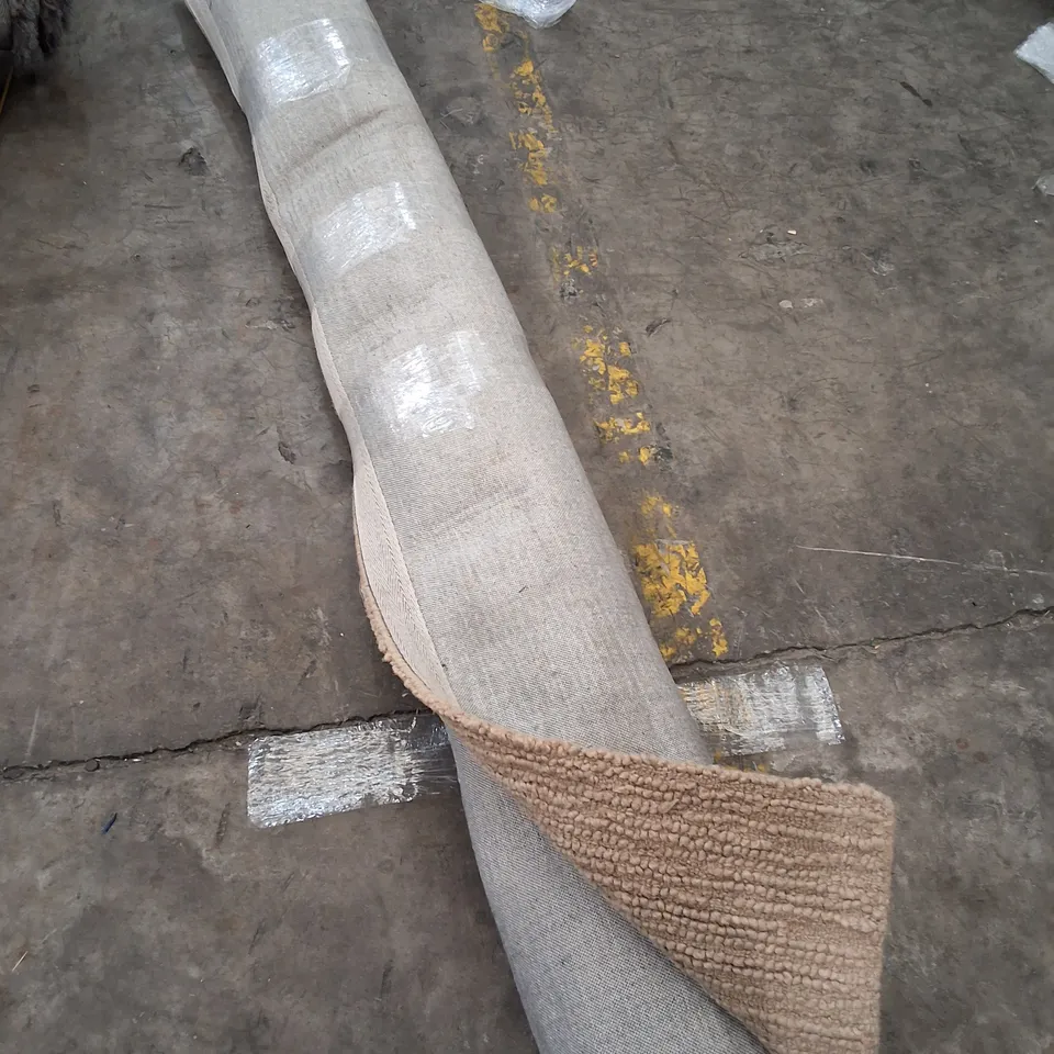 LARGE ROLLED TEXTURED RUG IN NATURAL 