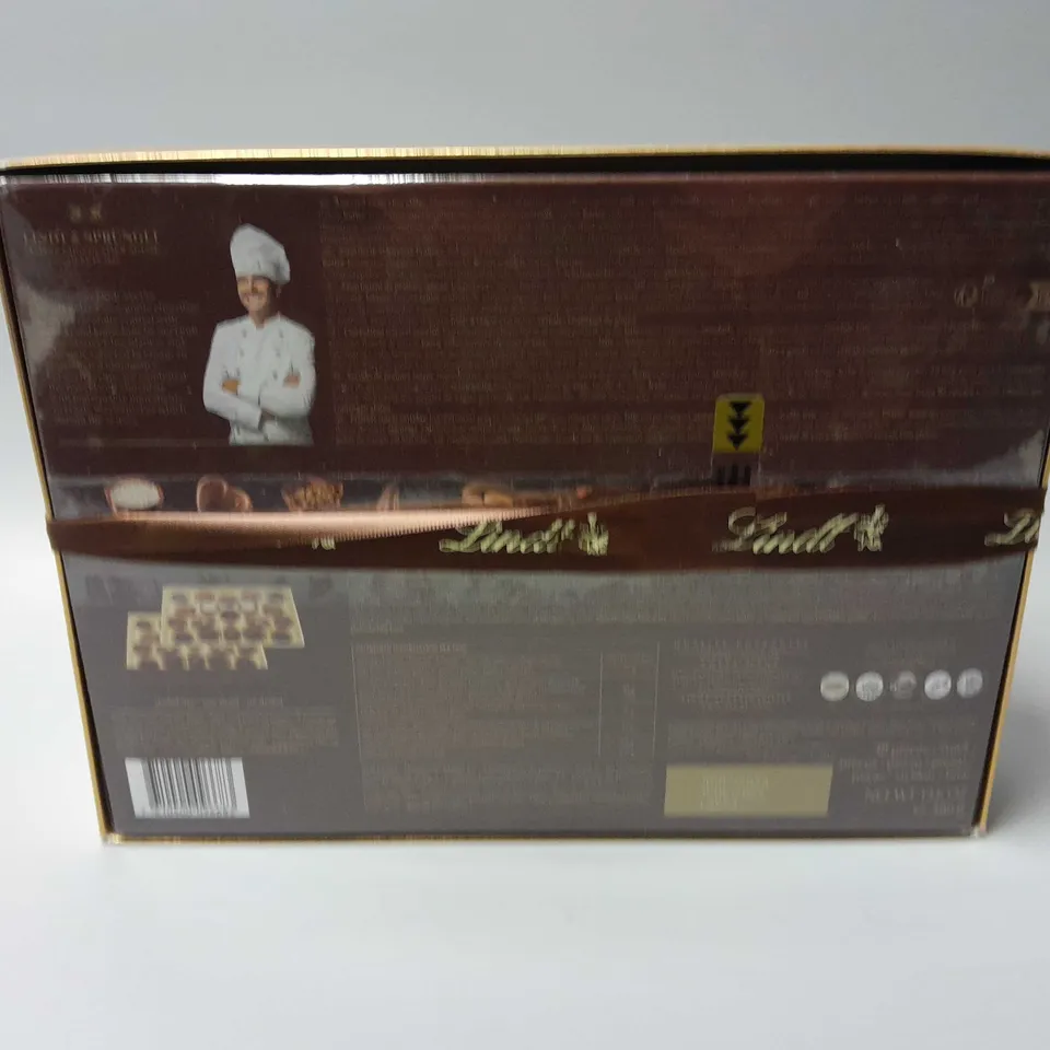 BOXED AND SEALED LINDT SWISS MASTERPIECES (38 ASSORTED PRALINES)