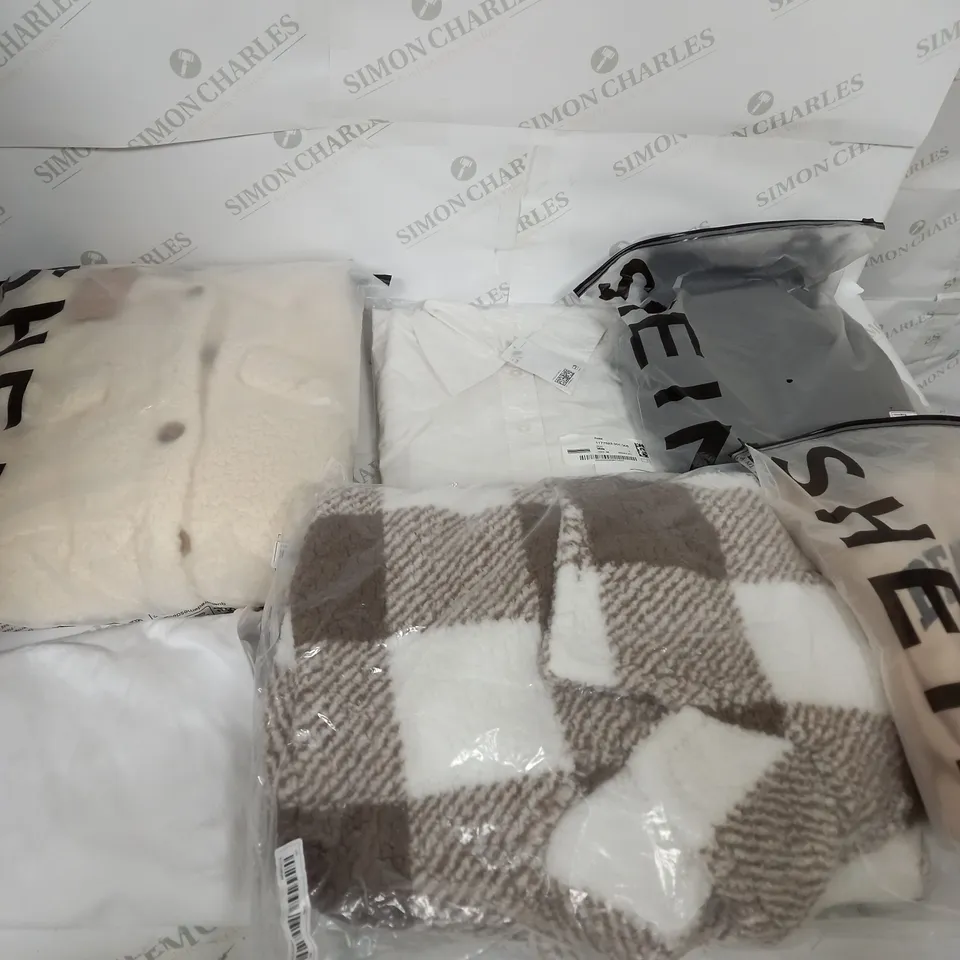 LARGE BOX OF ASSORTED CLOTHING ITEMS IN VARIOUS COLOURS AND SIZES INCLUDING TROUSERS , TOPS AND JUMPERS 