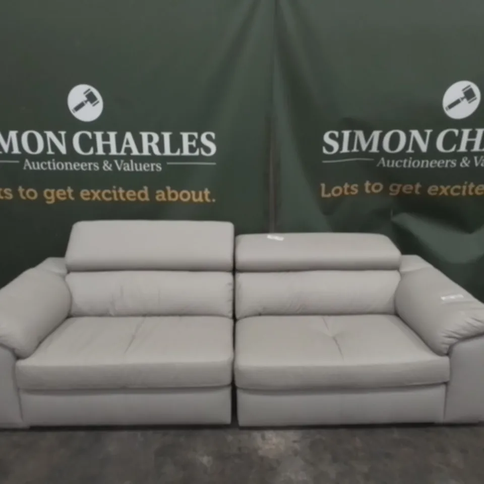 DESIGNER FAUX LEATHER THREE SEATER SOFA WITH ADJUSTABLE HEADRESTS