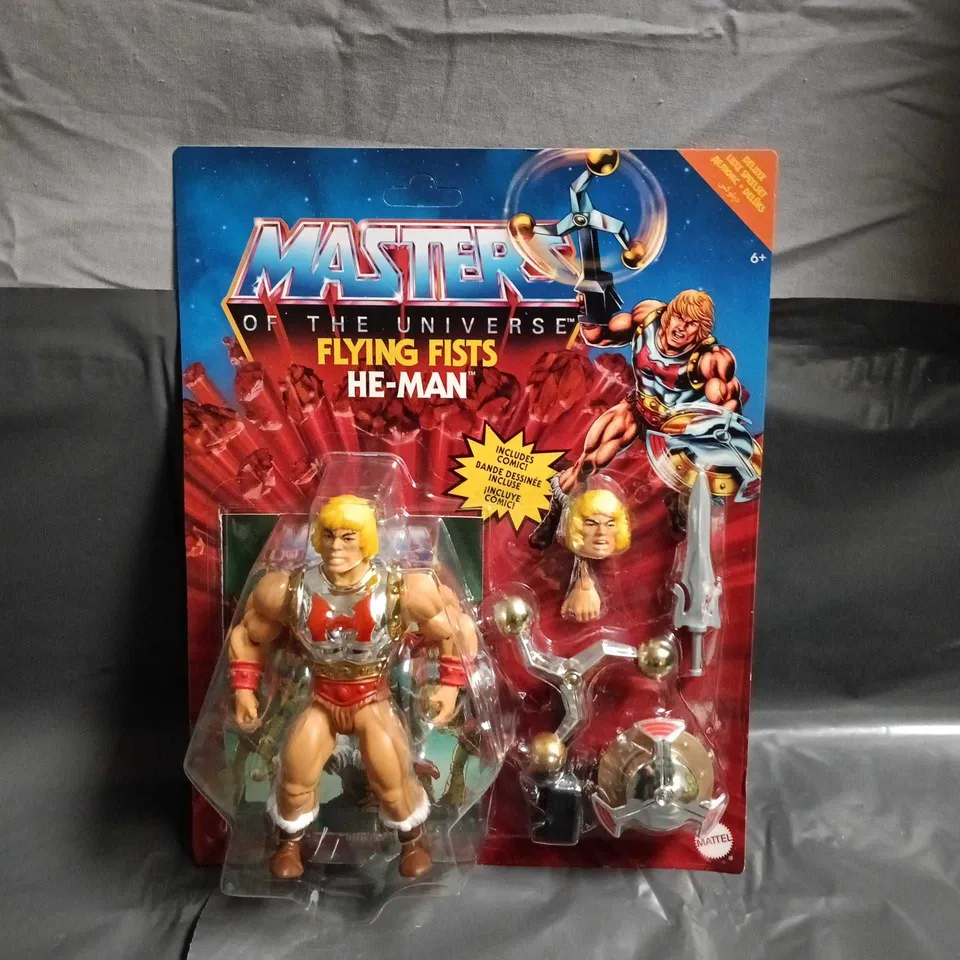 MASTERS OF THE UNIVERSE HE-MAN FLYING FISTS ACTION FIGURE – CARDED