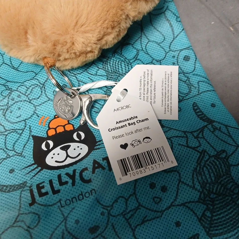 JELLYCAT AMUSEABLE CROISSANT BAG CHARM – CREAM/TAN