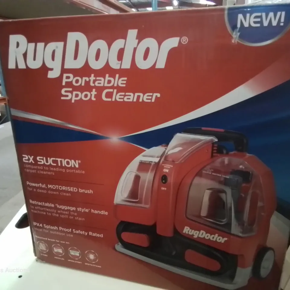 BOXED RUG DOCTOR PORTABLE SPOT CLEANER