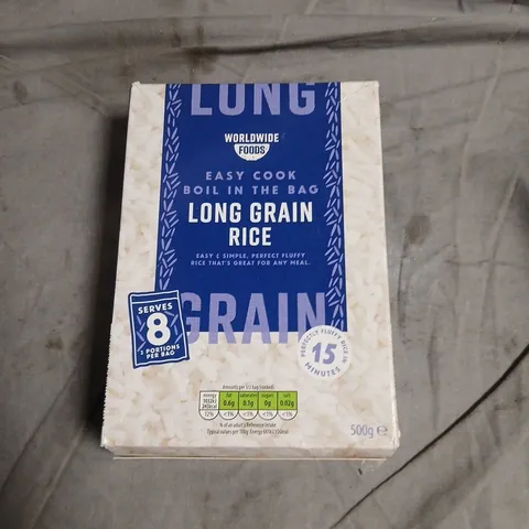 BOX OF APPROXIMATELY 12 ASSORTED FOOD ITEMS INCLUDING LONG GRAIN RICE , LUCOZADE CHERRY AND BRAZIL NUT TOFFEE