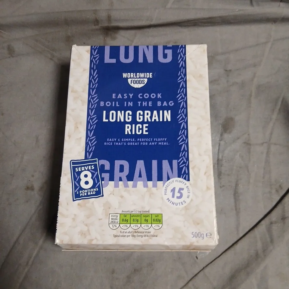 BOX OF APPROXIMATELY 12 ASSORTED FOOD ITEMS INCLUDING LONG GRAIN RICE , LUCOZADE CHERRY AND BRAZIL NUT TOFFEE