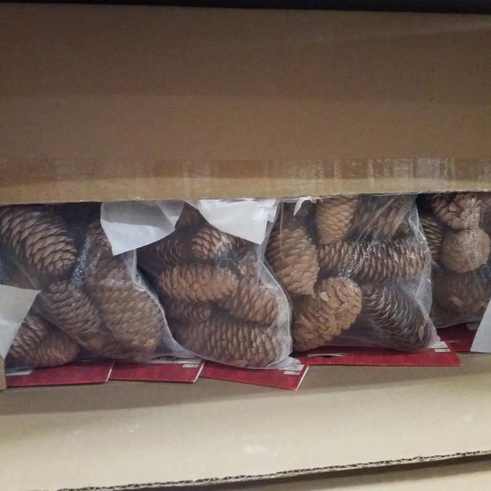 PALLET CONTAINING ASSORTED CHRISTMAS PRODUCTS & DECORATIONS INCLUDING MACHE GINGERBREAD HOUSE, SMALL BERRY FLORAL PICKS & LARGE PINECONES DECORATIONS