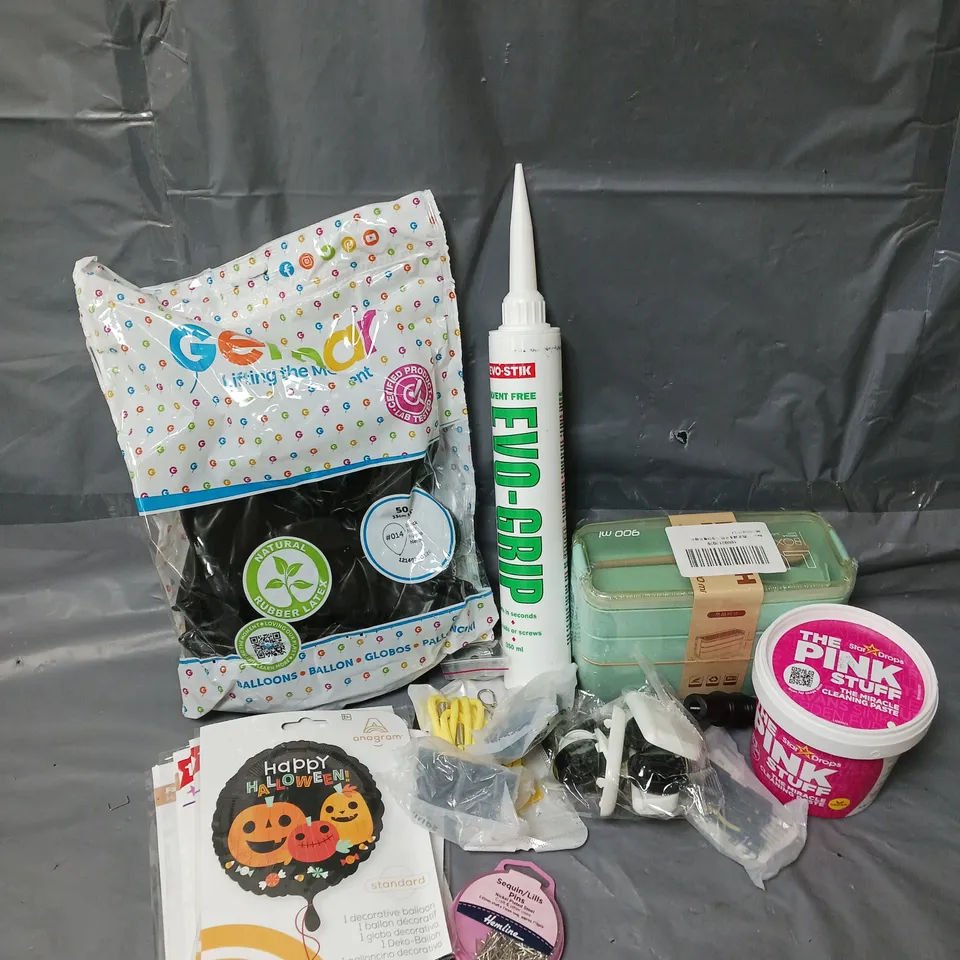 APPROXIMATELY 10 ASSORTED HOUSEHOLD ITEMS TO INCLUDE THE PINK STUFF CLEANING PASTE, HALLOWEEN BALLOONS, EV-GRIP HIGH STRENGTH ADHESIVE, ETC