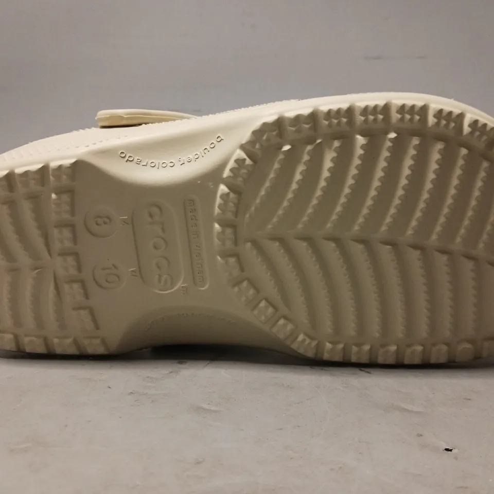 PAIR OF CROCS CLOGS IN BONE UK SIZE 7