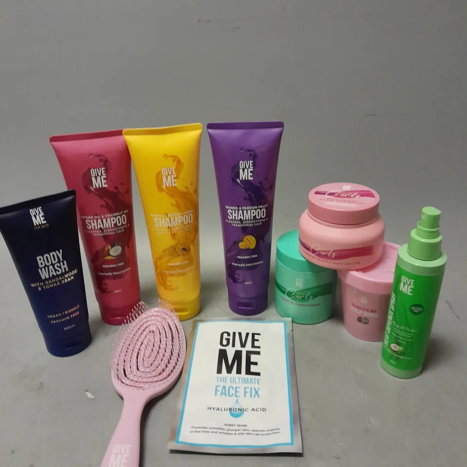 APPROXIMATELY 20 ASSORTED GIVE ME HAIR AND BODY PRODUCTS TO INCLUDE SHAMPOO, CONDITIONER AND BODY WASH