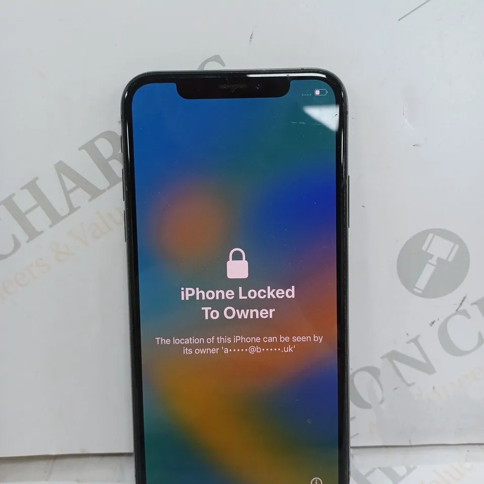 UNBOXED IPHONE X IN BLACK (LOCKED)