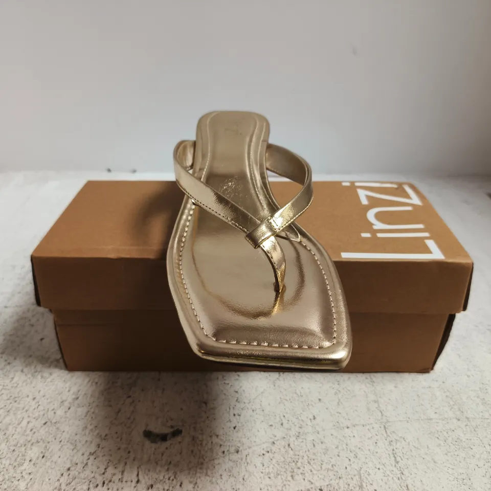 BOXED PAIR OF LINZI POTENTIAL LOW HEEL TOE-POST SANDALS IN METALLIC GOLD SIZE 7