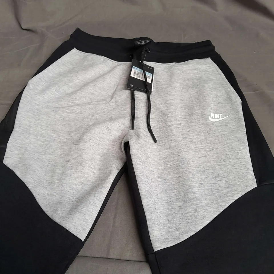 NIKE GREY & BLACK TRACKSUIT PANTS - MEDIUM
