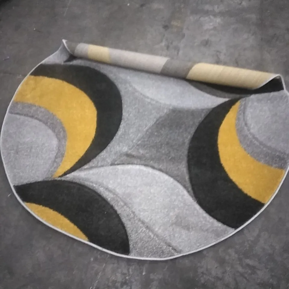STILLAGE OF APPROXIMATELY 40 DESIGNER RUGS