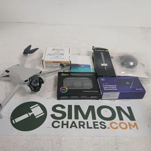 ELEVEN ASSORTED PRODUCTS TO INCLUDE; GREY QUAD-COPTER DRONE, MOUSE AND REMOTE CONTROL SWITCH
