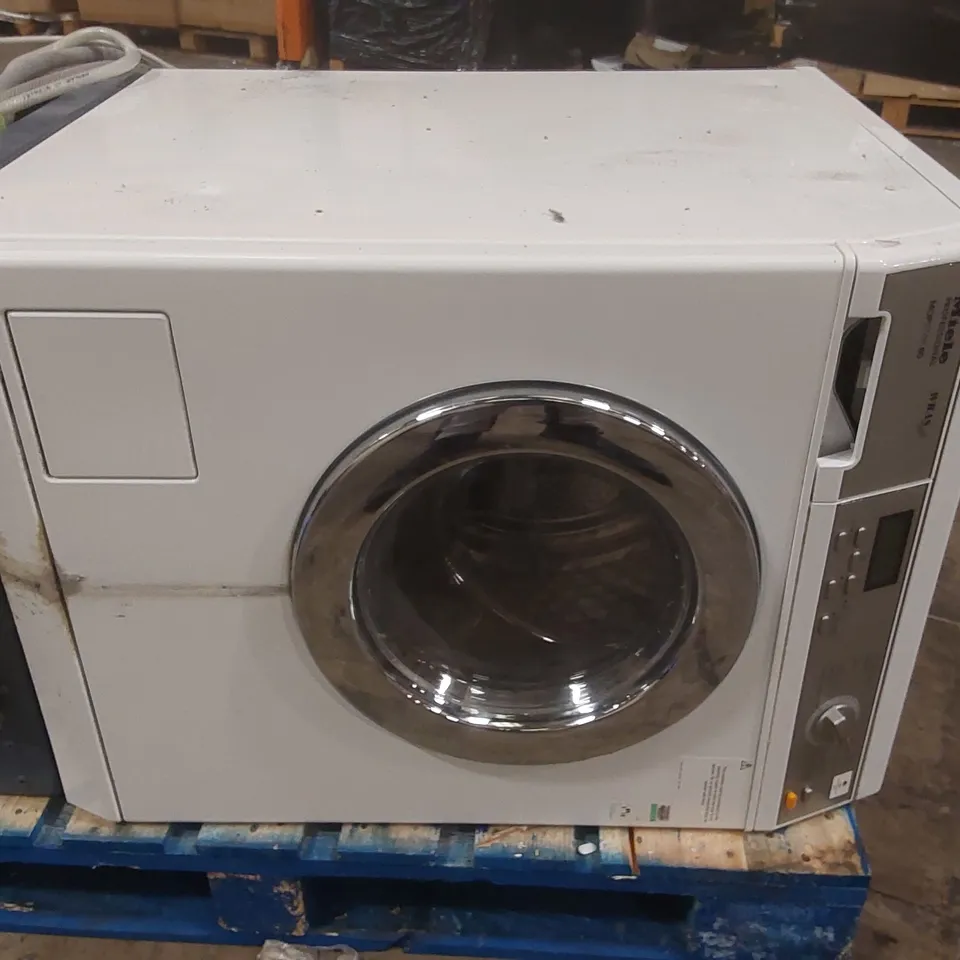 MIELE MOPSTAR 60 PROFESSIONAL WASHING MACHINE WITH SHELF STAND AND ASSORTED CLEANING PRODUCTS